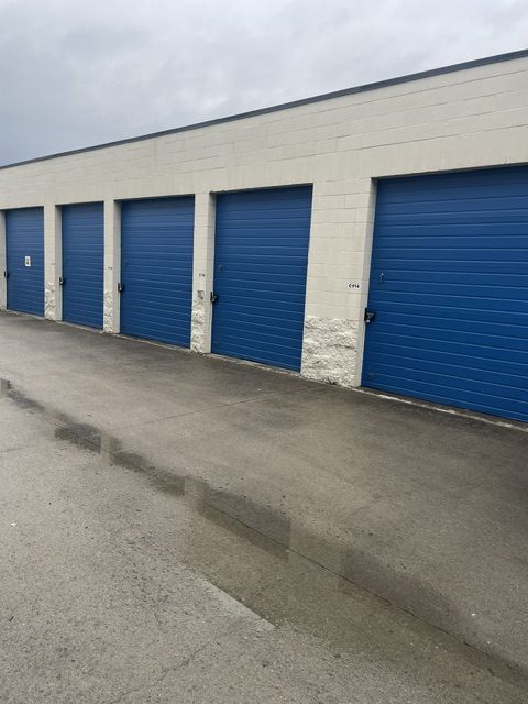 commercial garage doors after by 99 Dollar Painter in Middle Tennessee