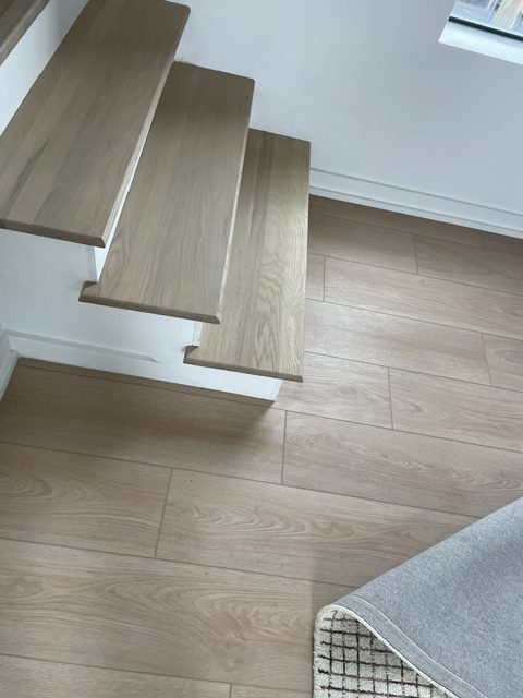 refinished stair floor by 99 Dollar Painter in Middle Tennessee