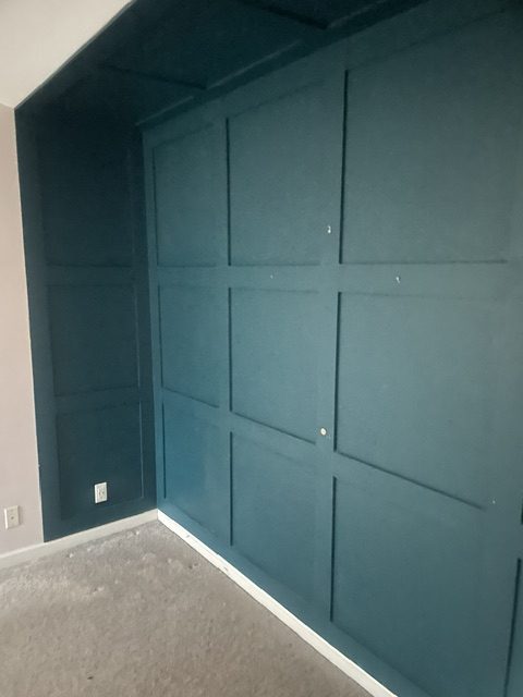 teal accent wall painting by 99 Dollar Painter in Middle Tennessee