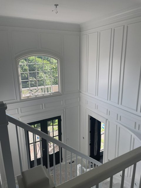 white paneled entry painting by 99 Dollar Painter in Middle Tennessee
