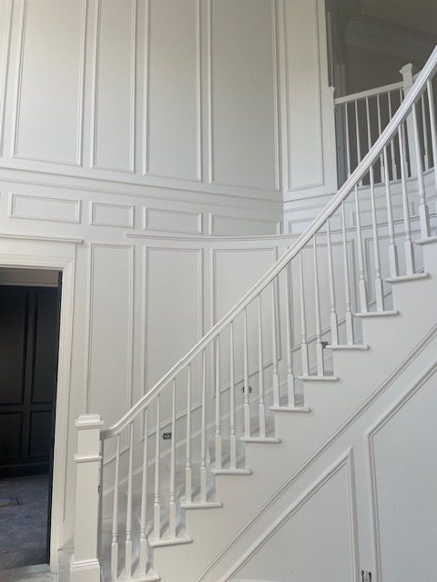 white staircase painting by 99 Dollar Painter in Middle Tennessee